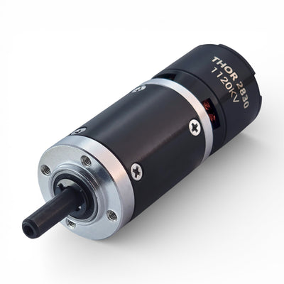 Full front face of MAXYNOS THOR 2830 1120 kV planetary gearbox showing bolt pattern and precision machined housing
